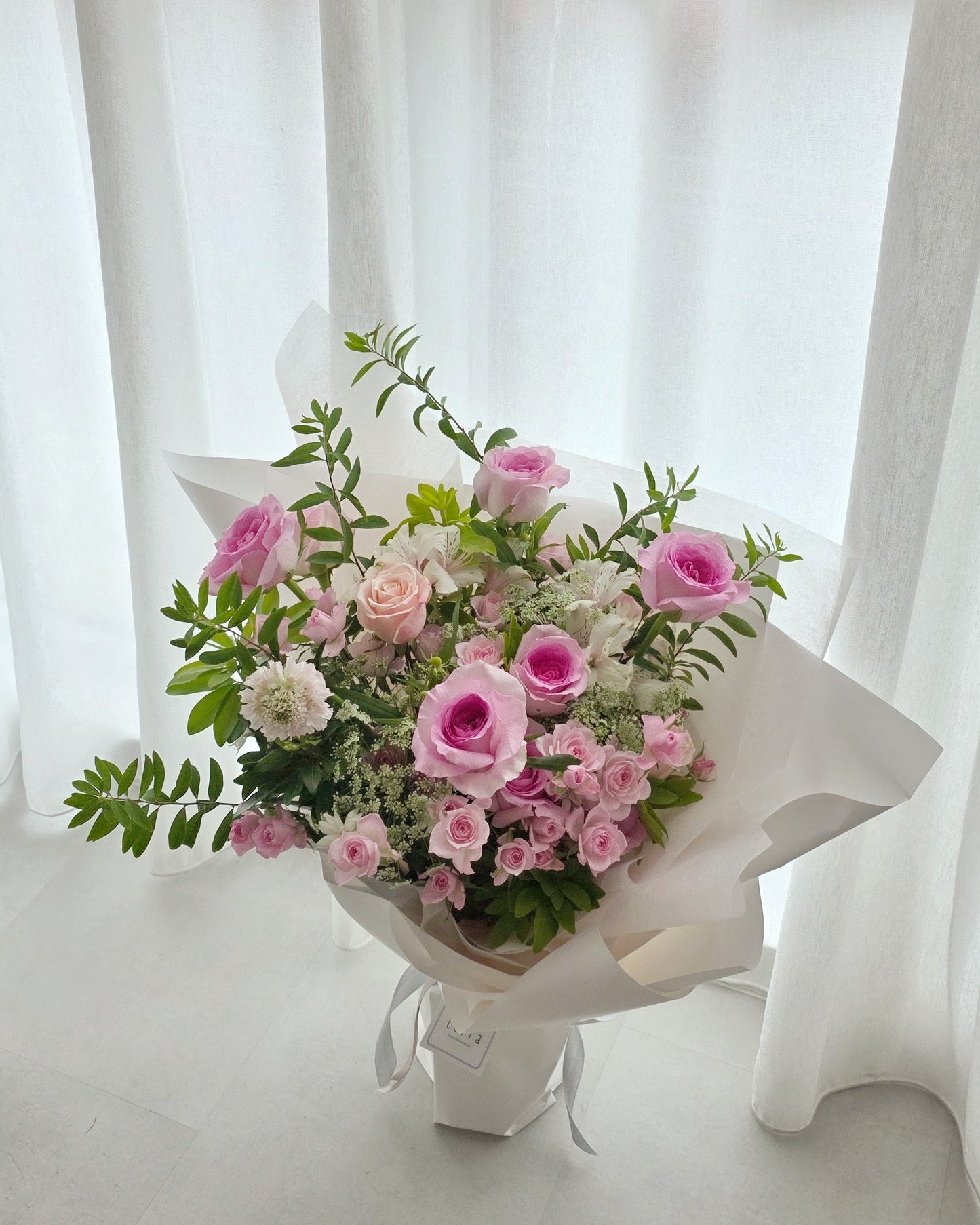 Soft pink rose bouquet handcrafted in Singapore. A romantic Valentine’s Day flower arrangement for heartfelt gifting. Available for delivery.