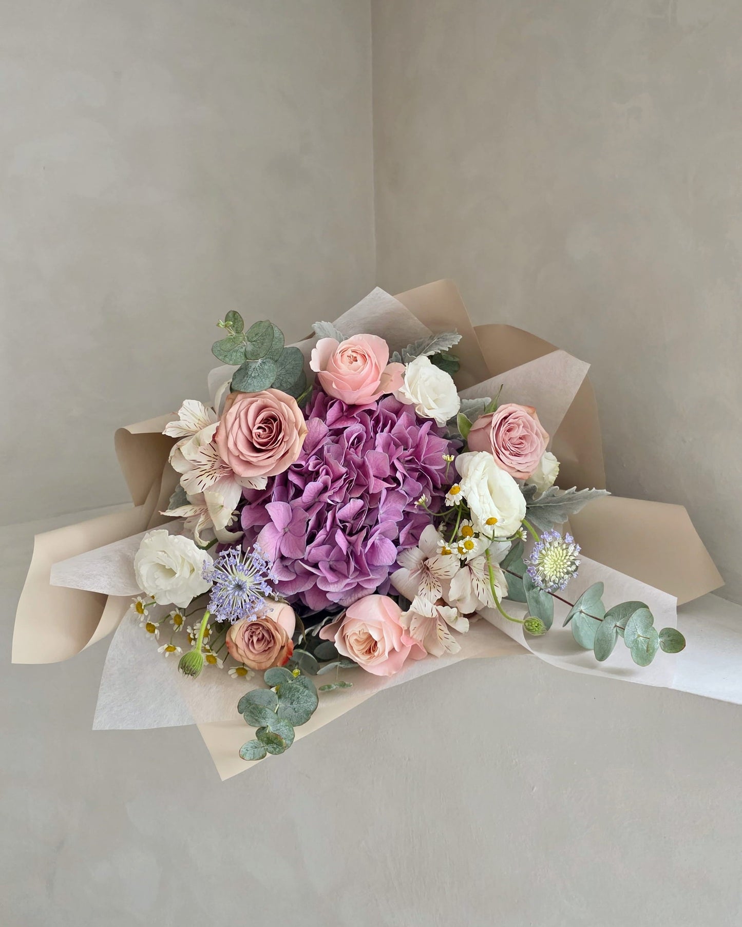 Meadow Sweet hydrangea and garden rose bouquet in soft pastel tones, handcrafted in Singapore
