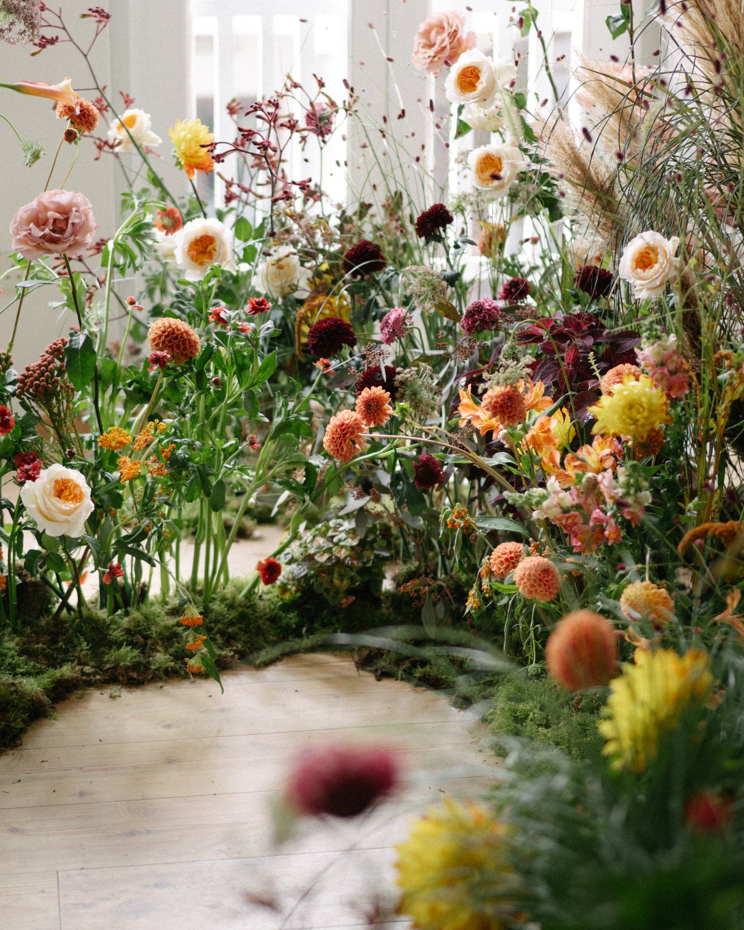 Floral arrangement with a variety of flowers in a natural setting