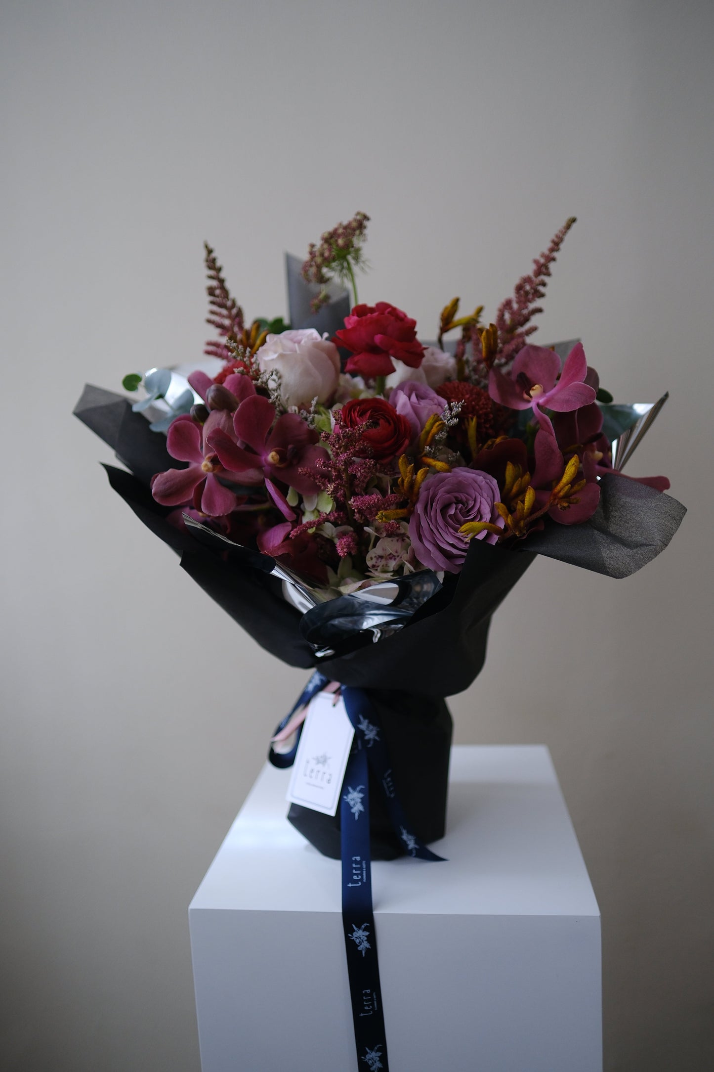 Bold Expressive Bouquet with Orchids Ranunculous Dark Red Filler Flowers