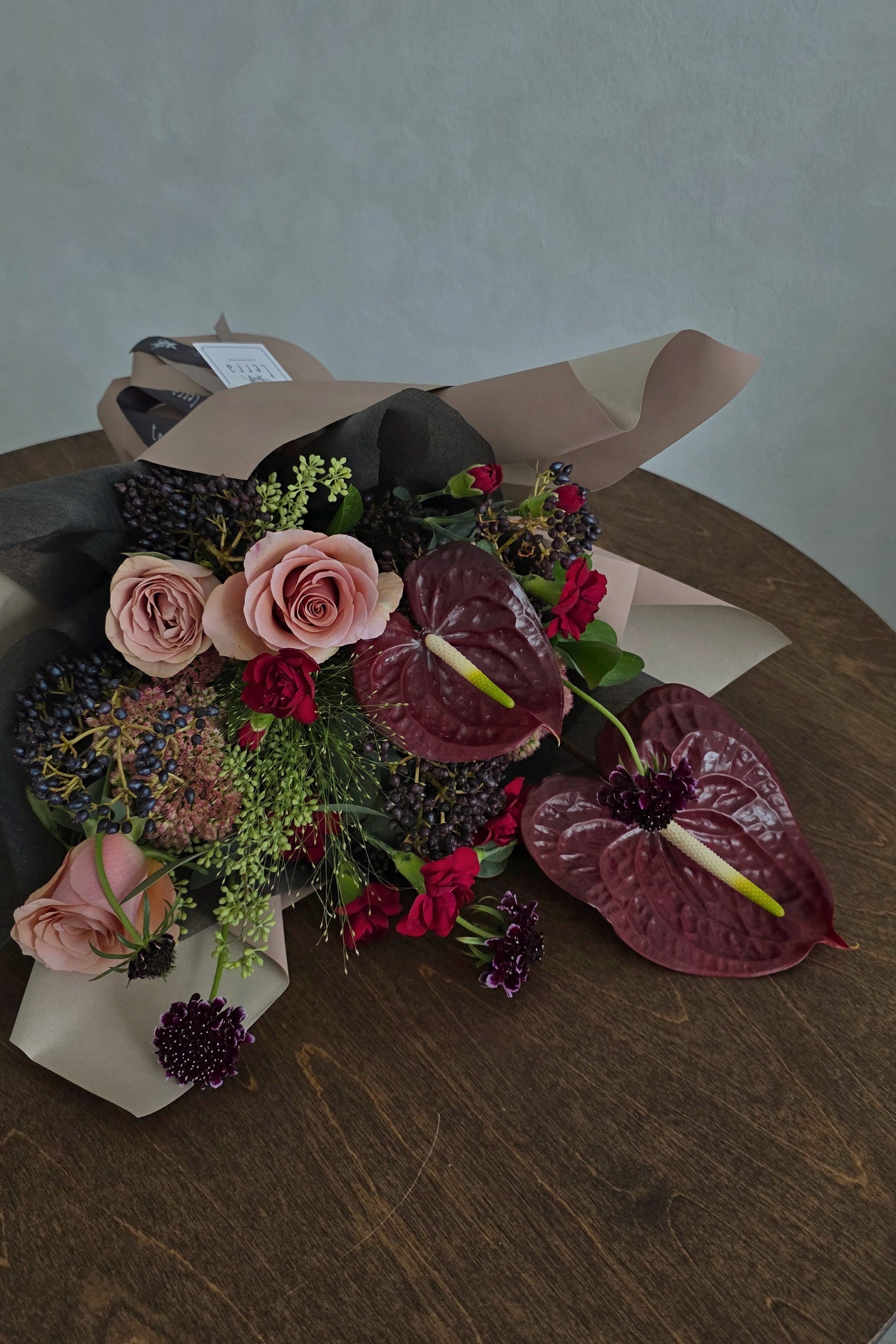 Bold and textural floral arrangement styled as a statement piece, designed by Terra’s Choice Singapore florist.