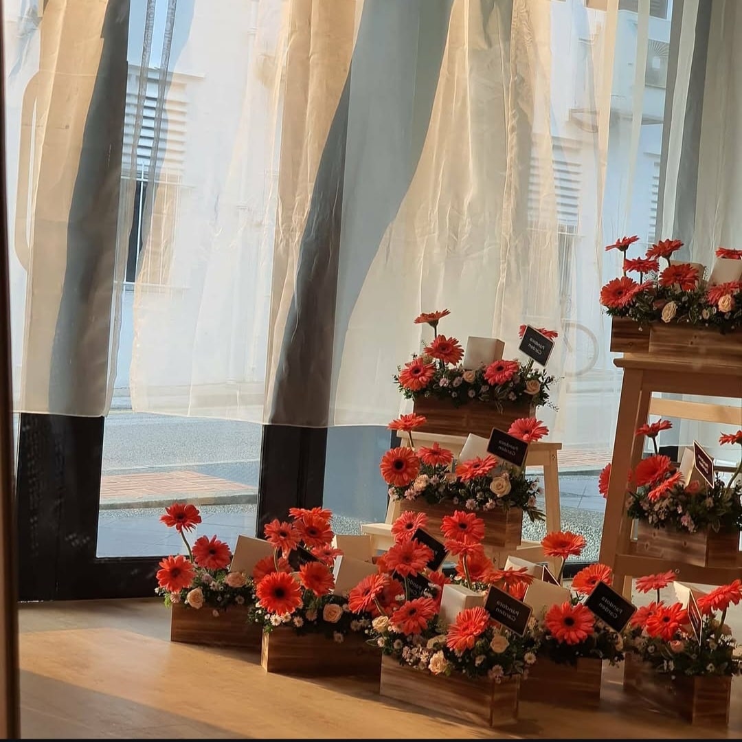 Corporate Gifting wooden floral crates with gerbera daisies for Pandora's New Product Launch