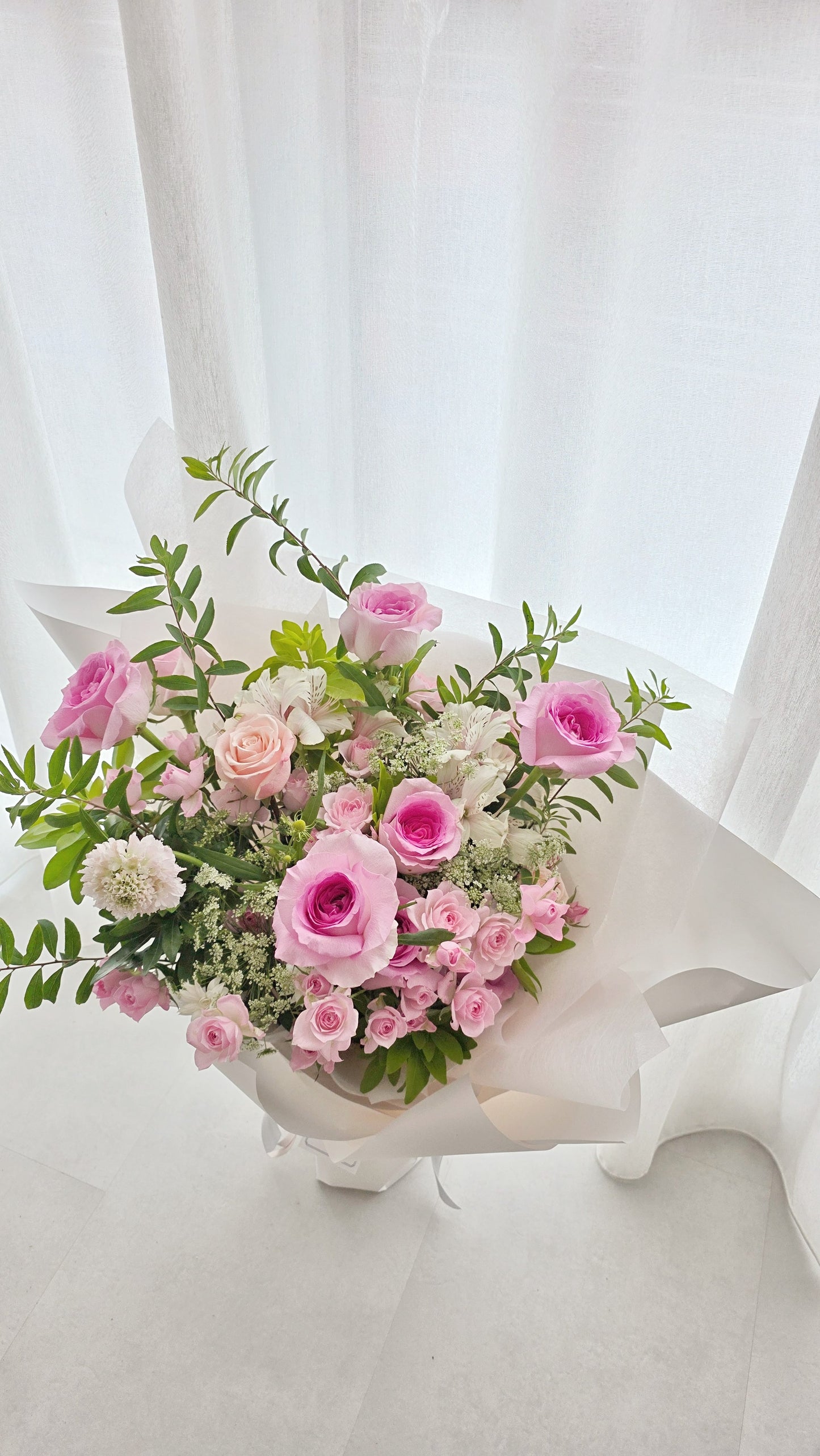 Soft pink rose bouquet handcrafted in Singapore. A romantic Valentine’s Day flower arrangement for heartfelt gifting. Available for delivery.