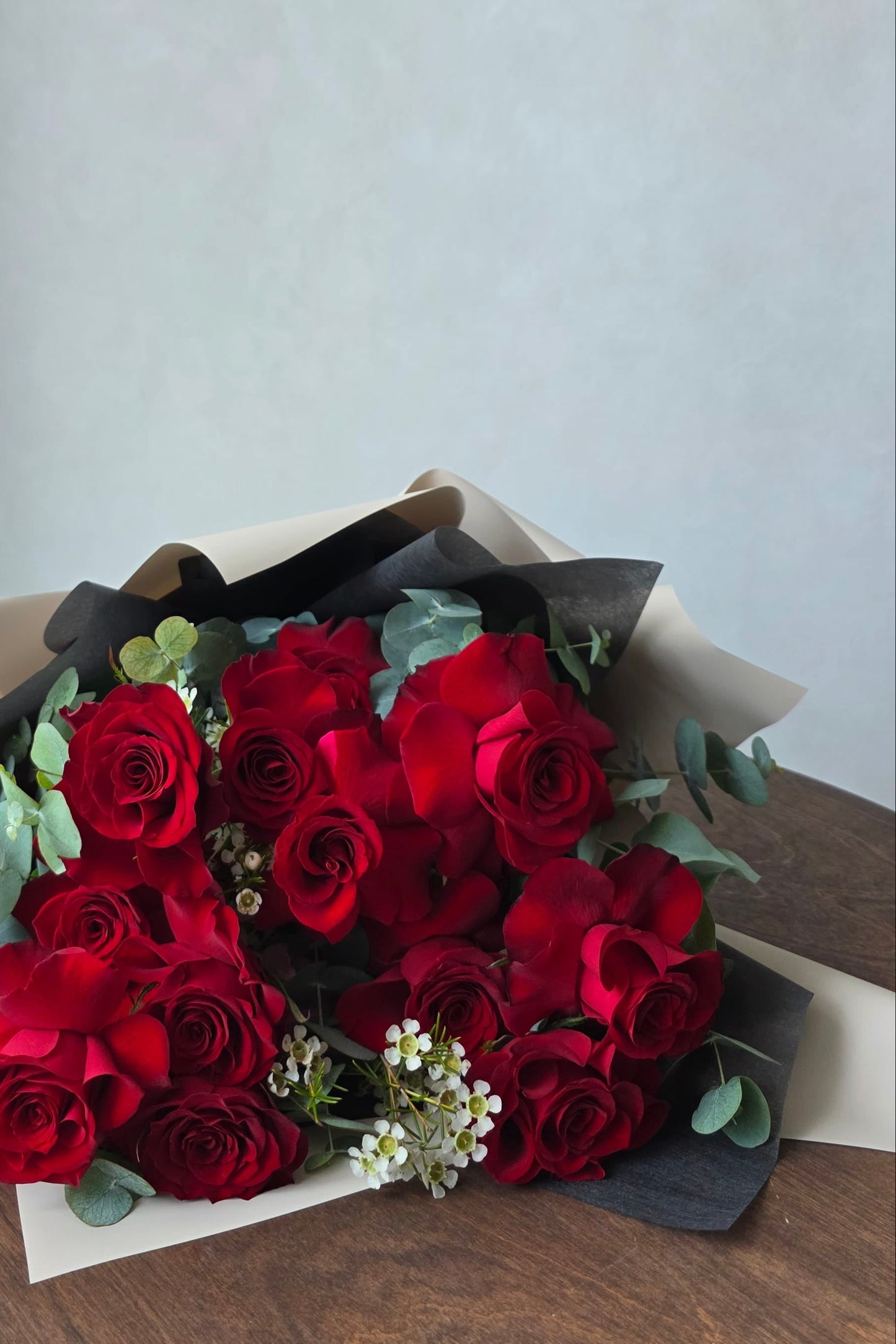 Close-up of premium red roses in Crimson Devotion bouquet