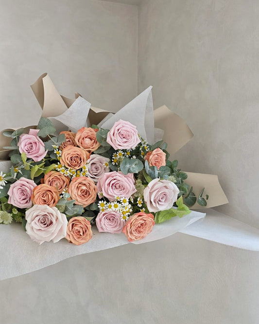 Elegant pastel rose bouquet with eucalyptus foliage, modern romantic floral arrangement Singapore