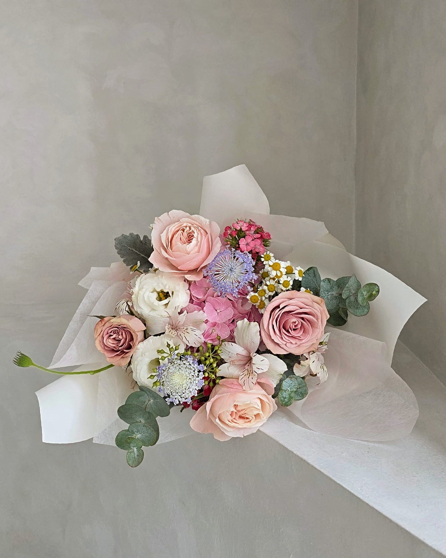 Petal Reverie hydrangea and garden rose bouquet in soft pastel tones, handcrafted in Singapore